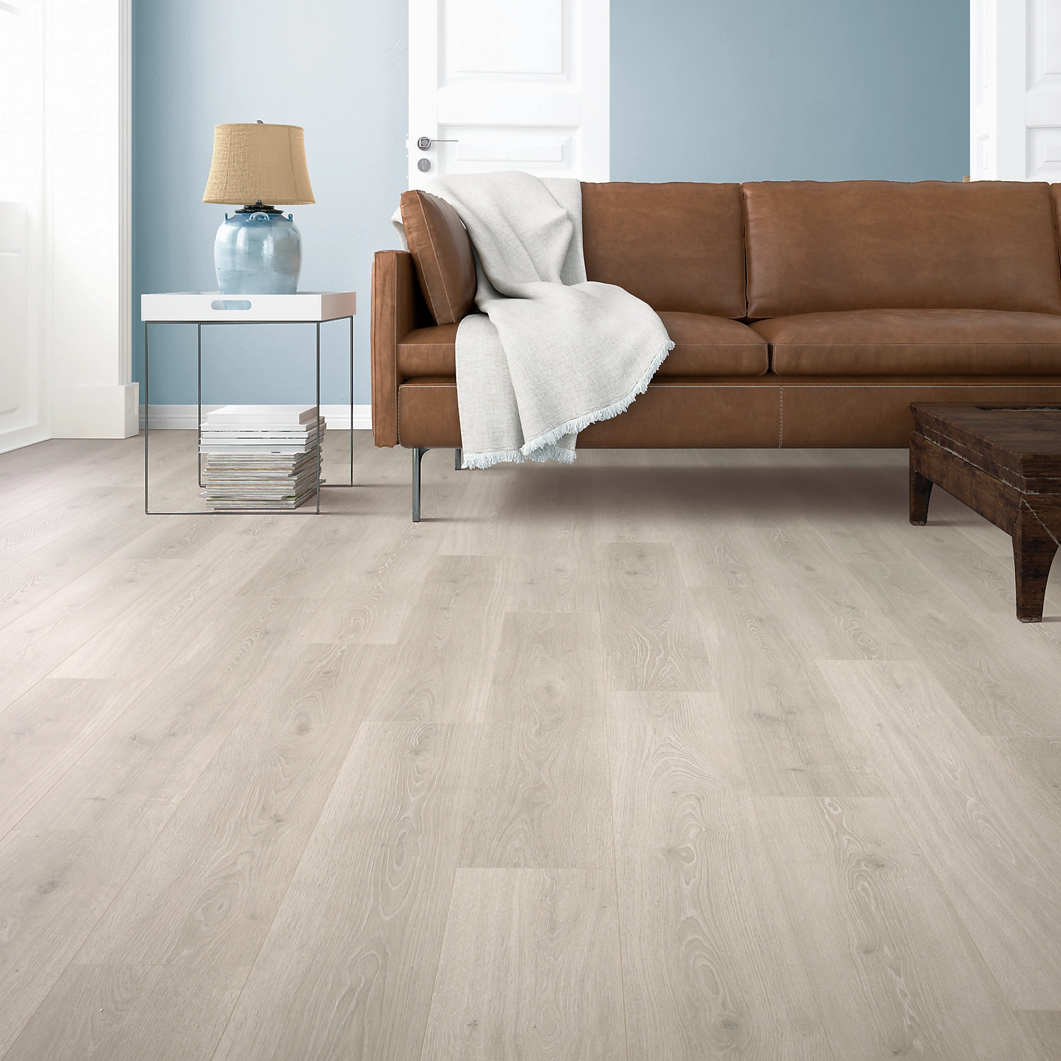Light whitewashed laminate flooring with realistic oak grain